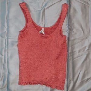 This is a coral color crop top, size XS